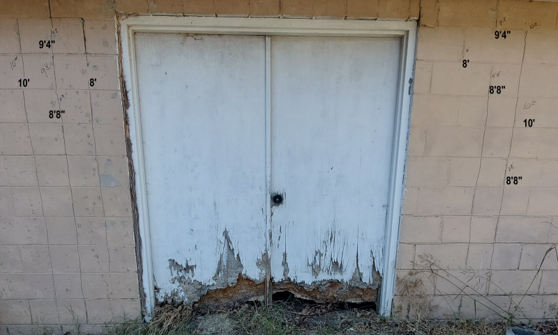 Measuring and marking the wall to cut