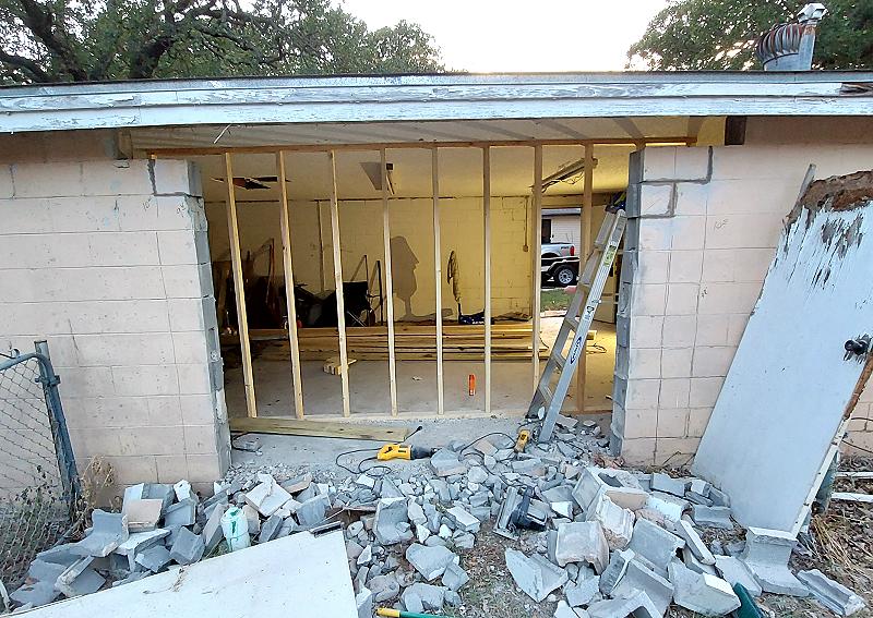 Cinderblocks reset into place with mortar.