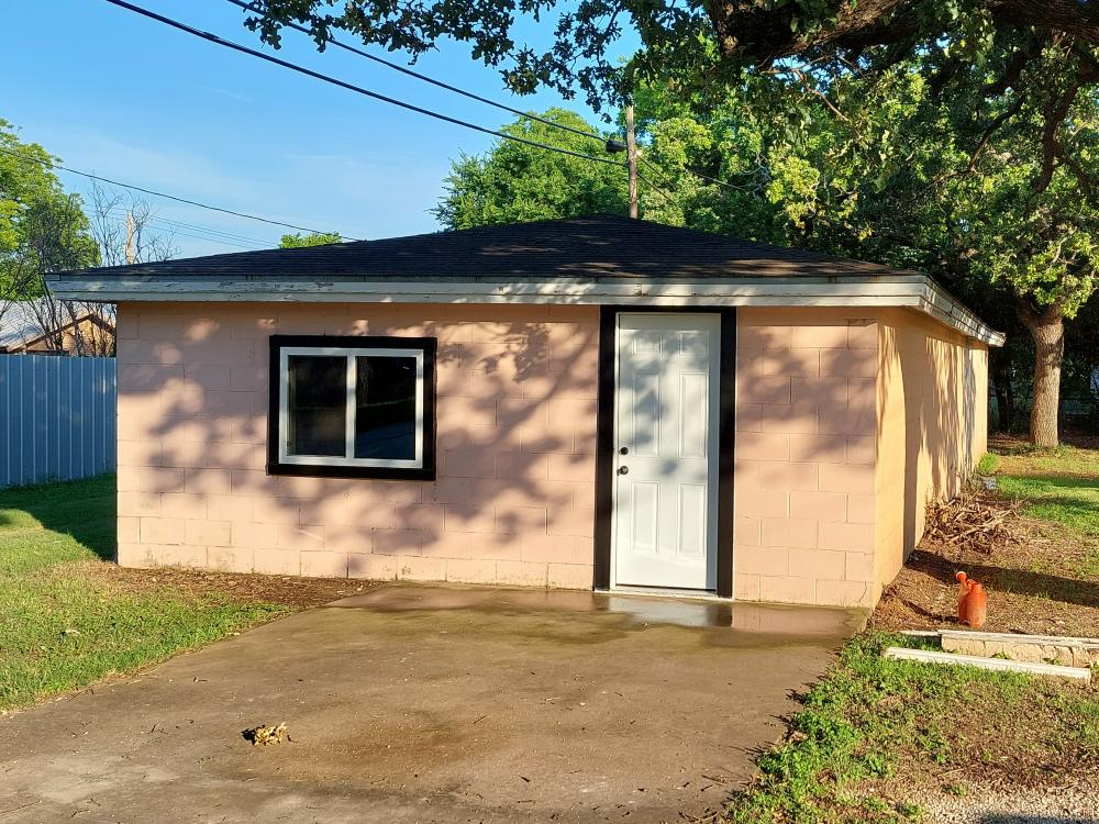 View of the building with a new window and door